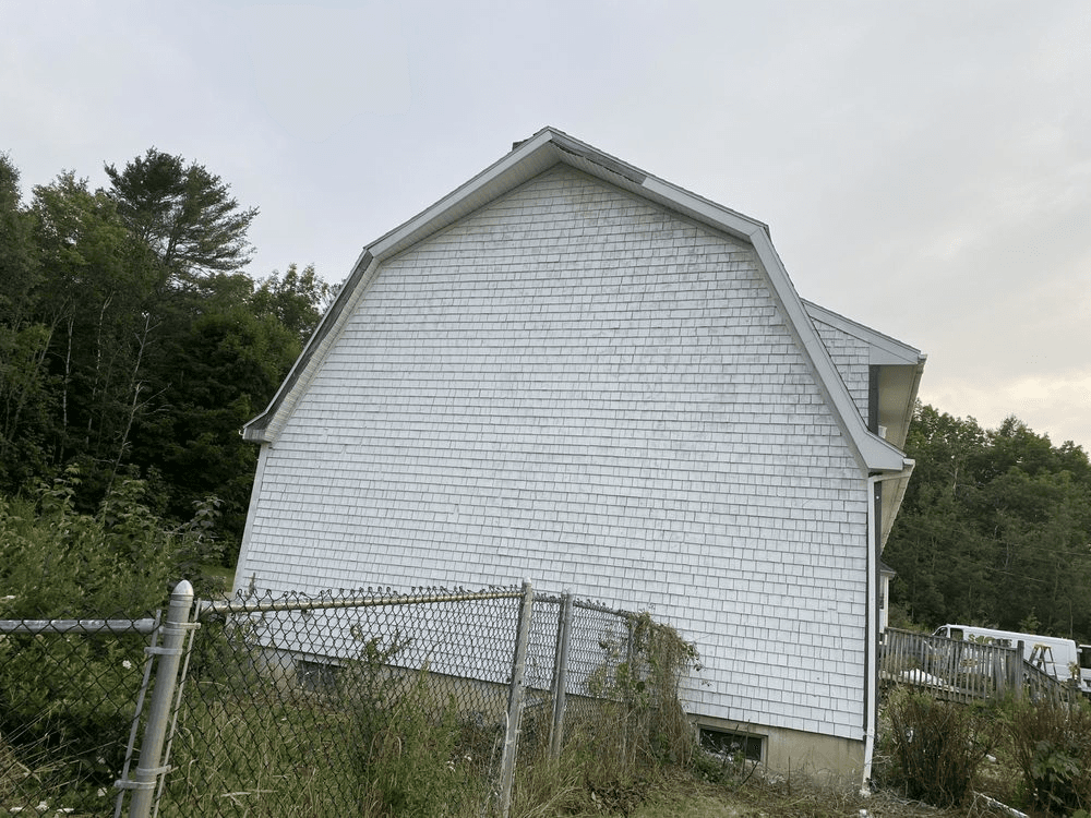 Clean white, house siding, after it was powerwashed